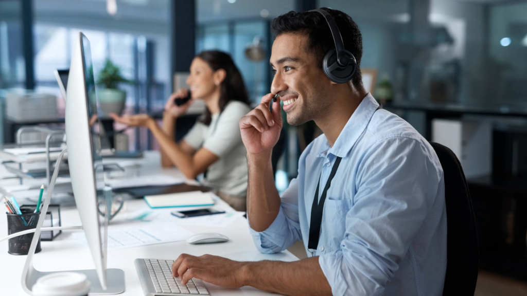 A team member representing the positive and approachable support needed to help new sales hires succeed. This image aligns with the article's focus on the 90-day blueprint for turning new sales hires into top performers.