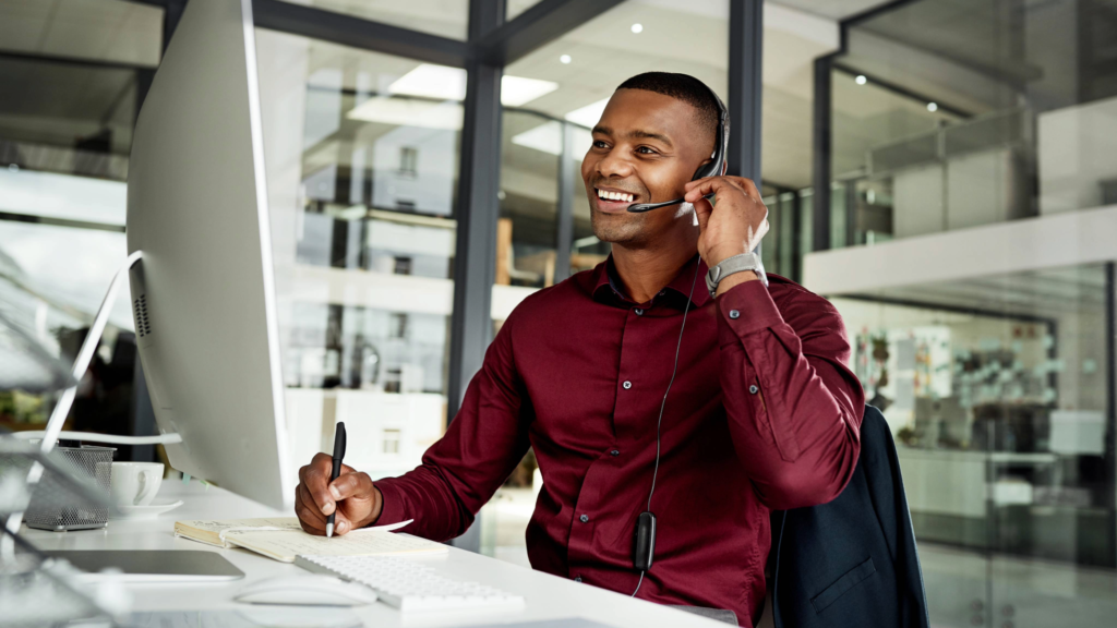 A team member networking for their company on their cellular phone.