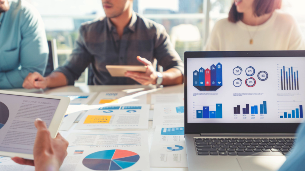 Close-up of digital sales data and KPIs during a marketing and sales strategy meeting, highlighting the importance of performance metrics.