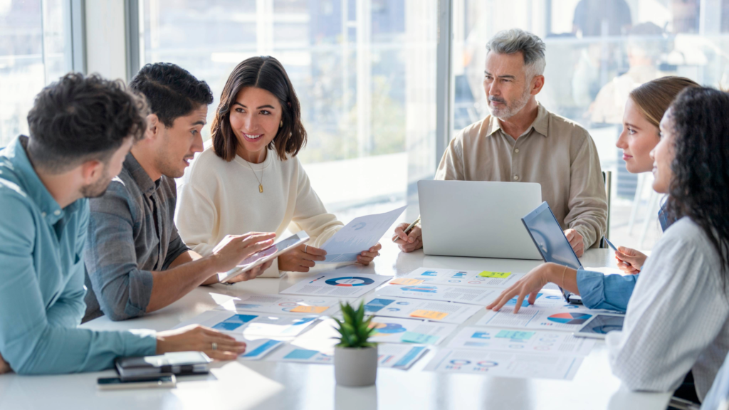 Working as a team in an office to develop winning sales strategies.