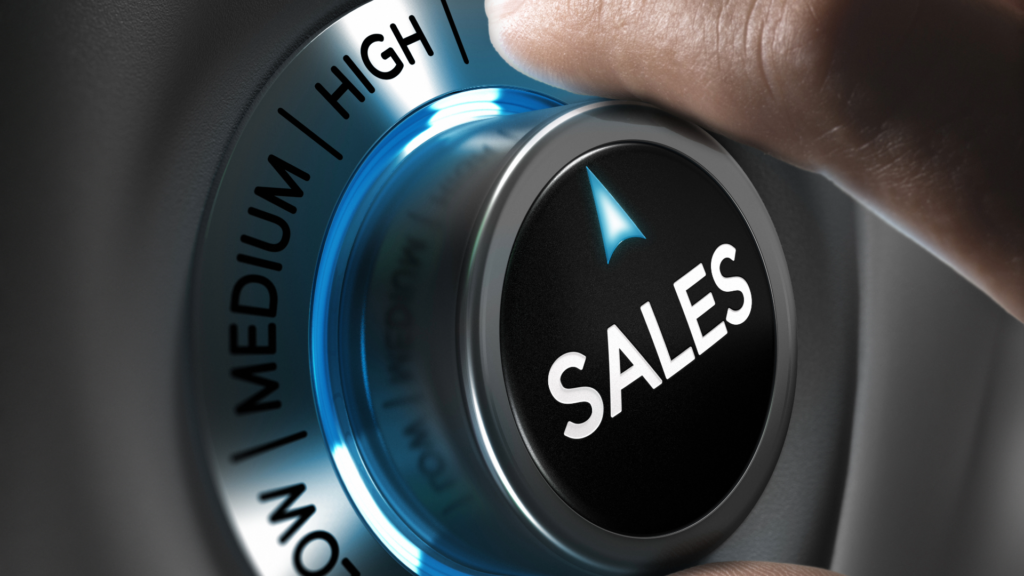 A close up view of a sales dial that is set to high after the sales process has been optimized for performance and revenue attainment